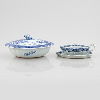 A blue and white vegetable tureen with cover and a sauce boat with a dish, Qing dynasty, 18th Century.