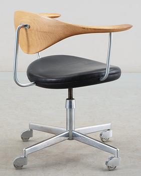 A Hans J Wegner 'Swivel chair', Johannes Hansen, Denmark circa 1960.