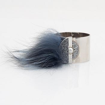 Fendi, a silvertone metal, rhinestone and fur bracelet.