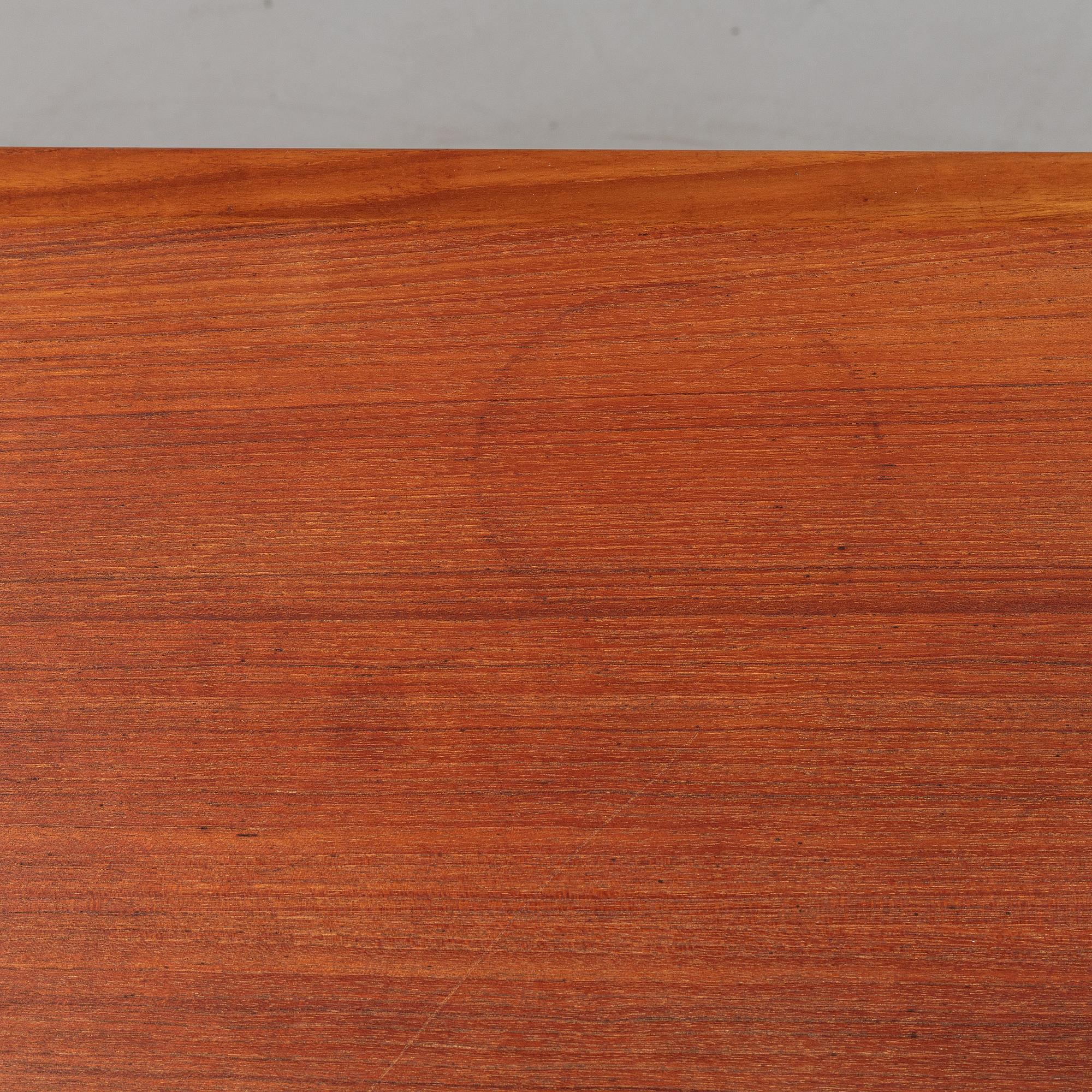 A 1950/60's dining table from Slagelse Møbelvaerk A/S with two additional leaves.