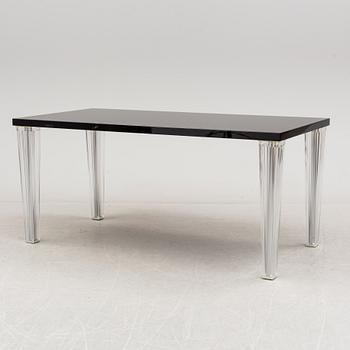 A "Tip Top" dining table by Philippe Starck for Kartell.