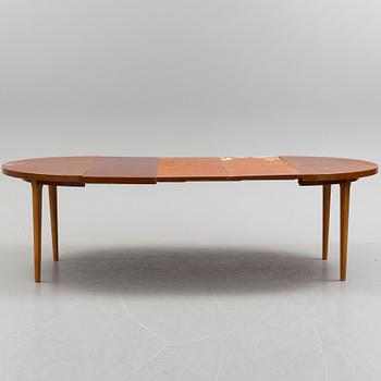 A 1940s mahogany veneer table.
