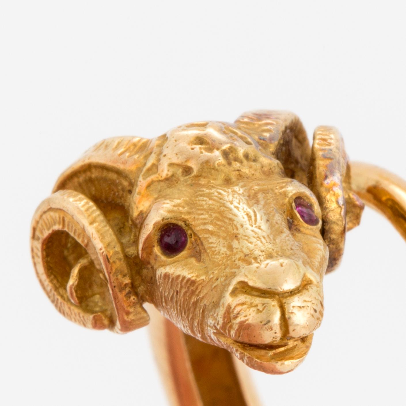 An 18K gold ring.