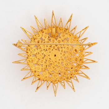 Gold brooch.