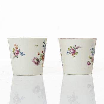 A pair of cups and saucers, France, 18th Century.