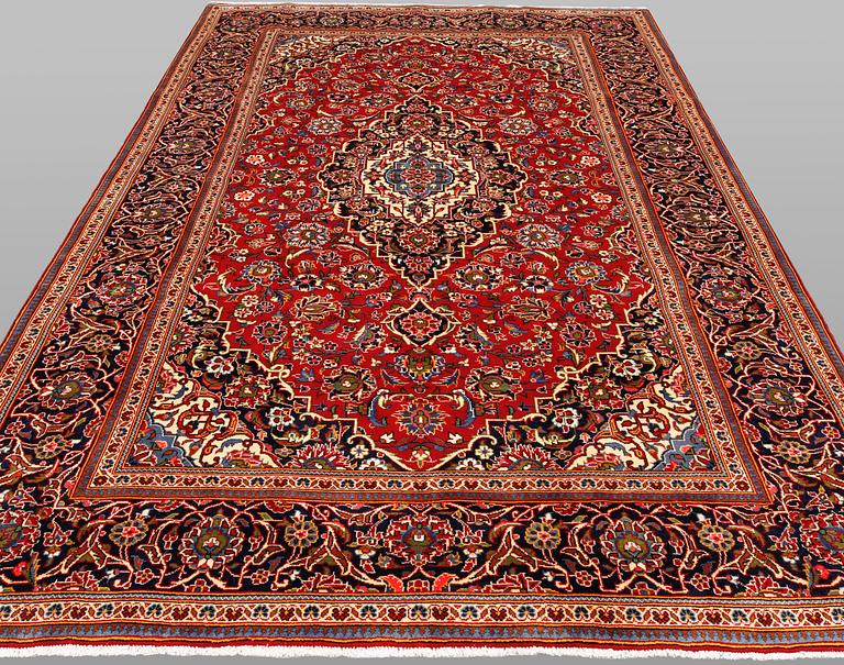 A Keshan carpet, 304 x 203 cm.