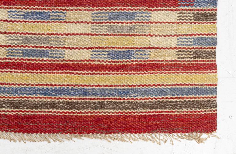 A flat weave carpet, c. 256 x 158 cm.