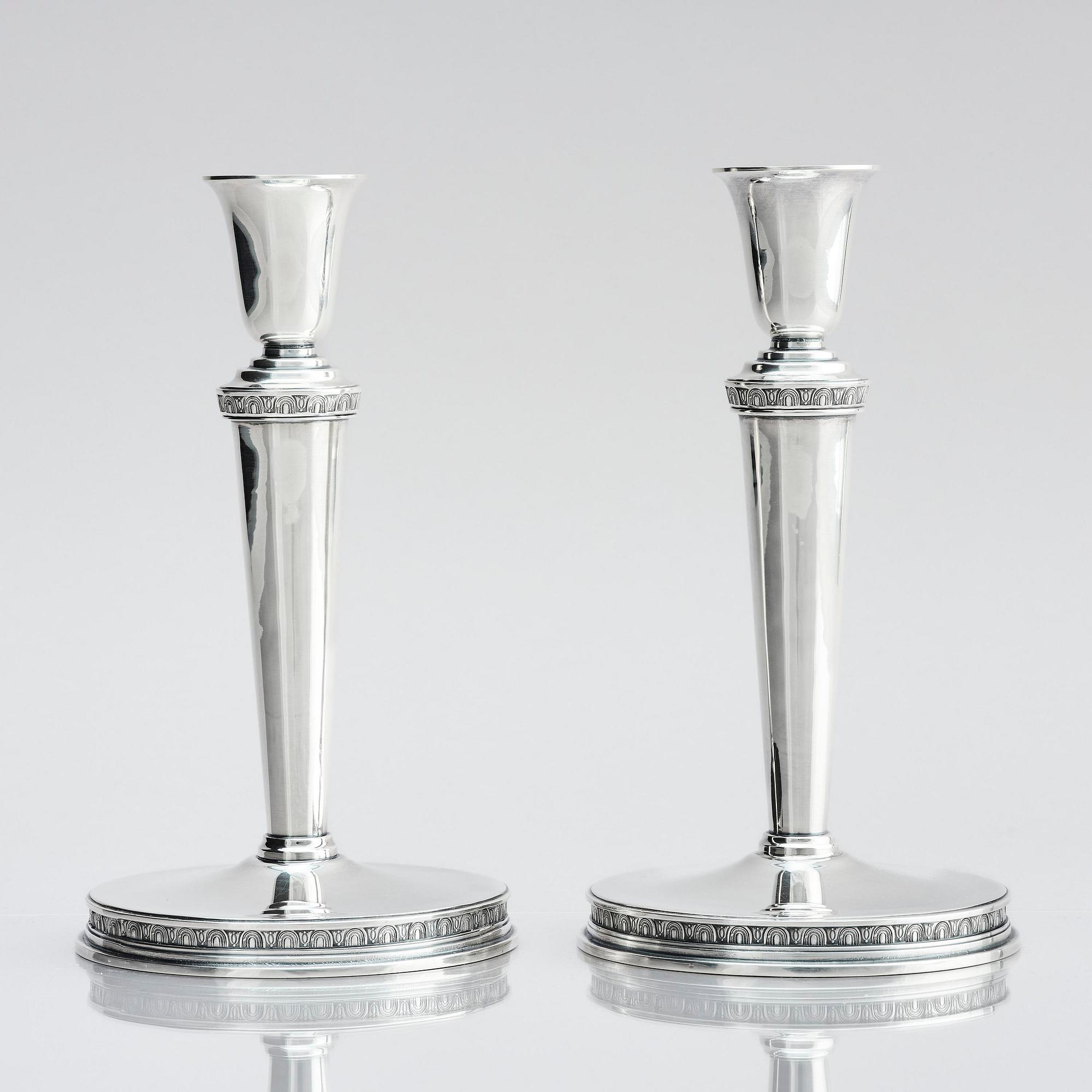 Eric Råström, a pair of silver candlesticks, company CG Råström, Stockholm 1974.