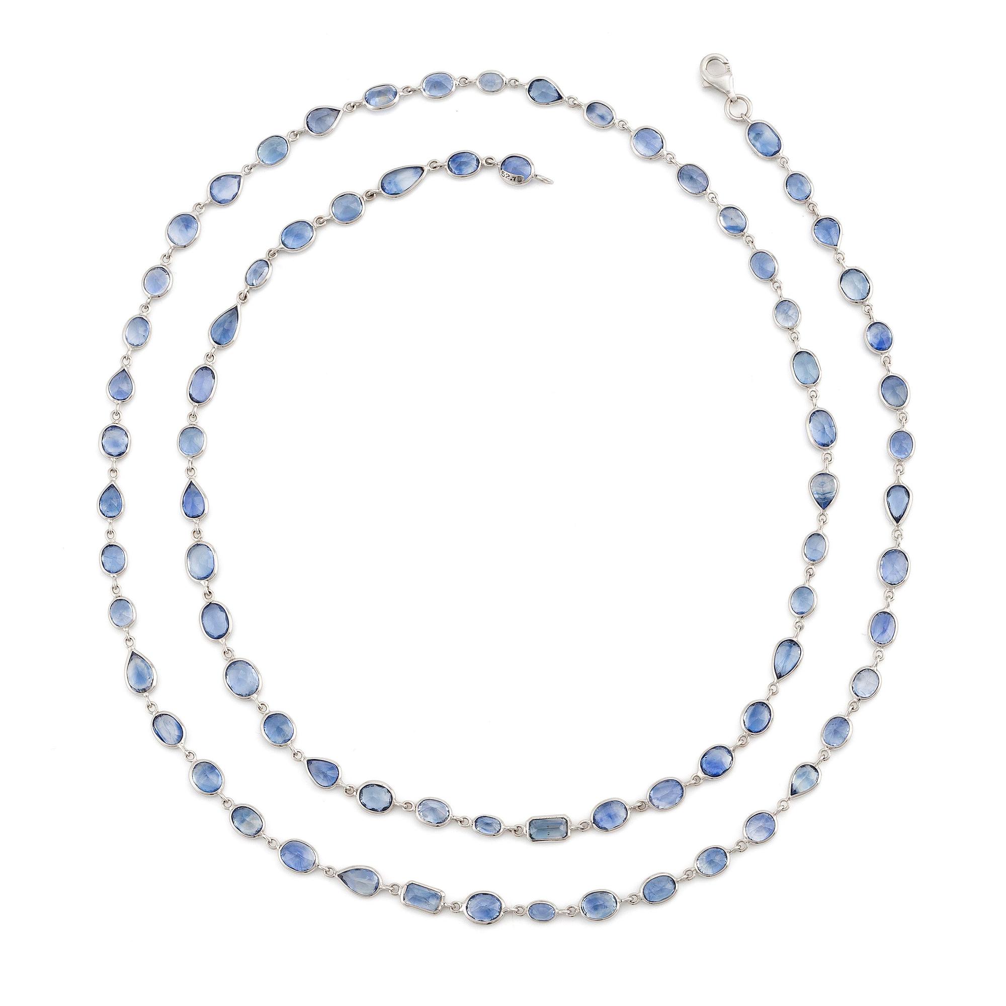 An 18K white gold necklace set  with faceted sapphires.