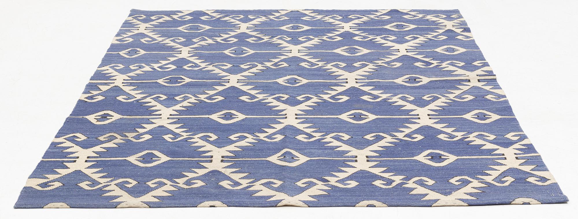 A rug, Kilim, ca 228 x 183 cm.