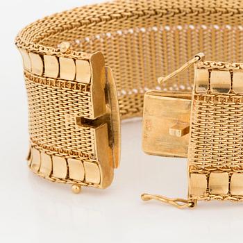 BRACELET, 18K gold, woven pattern with polished rectangular discs along the edges.