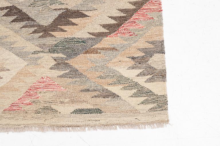 A Kilim runner, c. 290 x 80 cm.