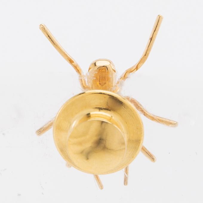 Olle Ohlsson, brooch in the form of an ant, 18K gold and yellow metal.