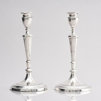 A pair of 18th century silver candlesticks, marks of John Parson & Co, Sheffield 1791.