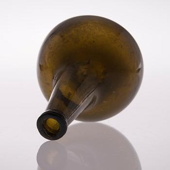 An 18th century glass  bottle.