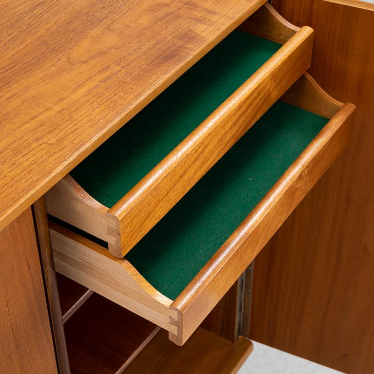 A teak veneered sideboard, mid 20th Century.