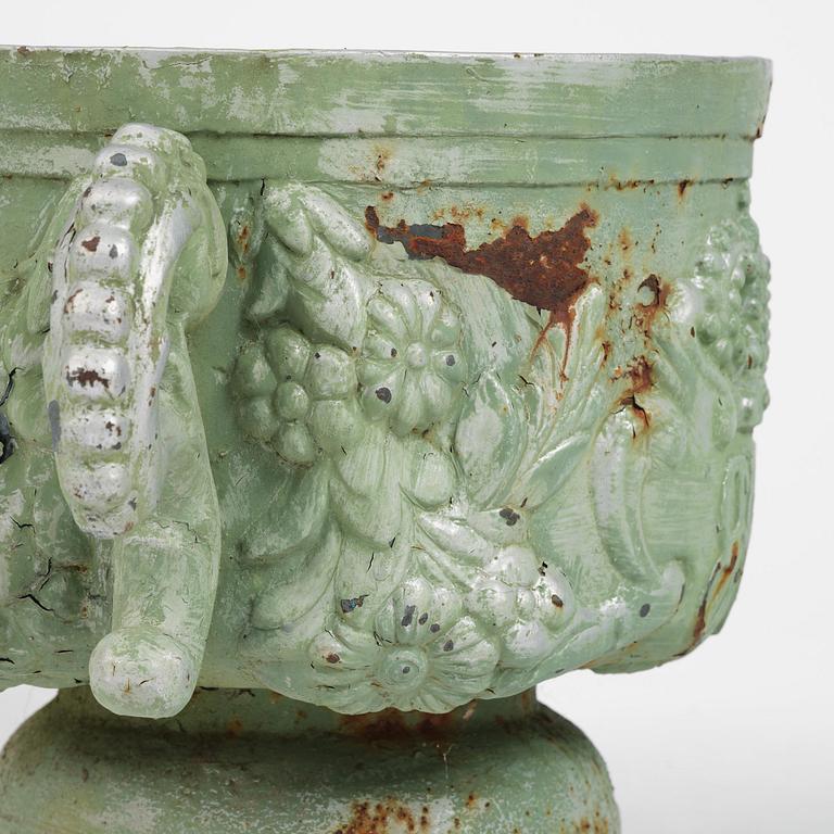 A pair of Swedish cast-iron garden urns, presumably later part 19th century.