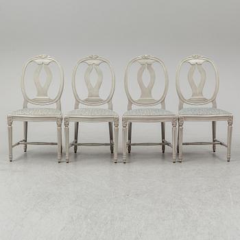 A dining table and four chairs, gustavian style, late 20th century.