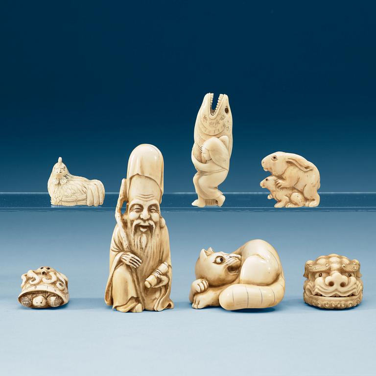 A set of six ivory netsukes and and Okimono, Japan, Meiji (1868-1912).