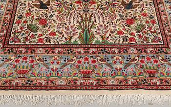 A semi-antique Kirman Laver carpet, 'Millefleur', c. 314 x 210 cm.