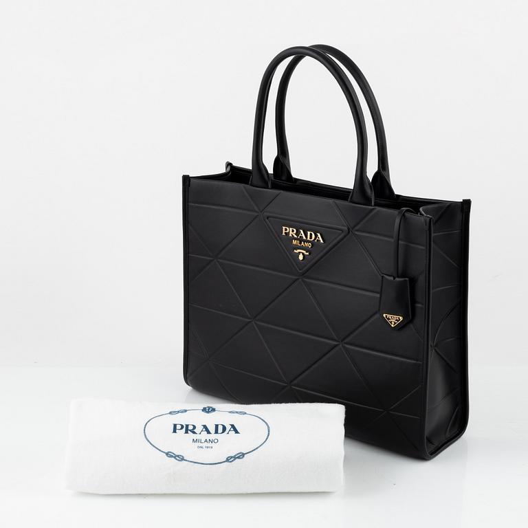 Prada, a black leather bag.
