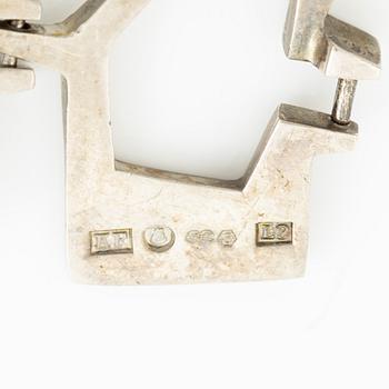 PA Lundahl-Terrs, a crown, two bracelets, a brooch, a earring, and a pendant, silver, Stockholm and Växjö, among others 1961.