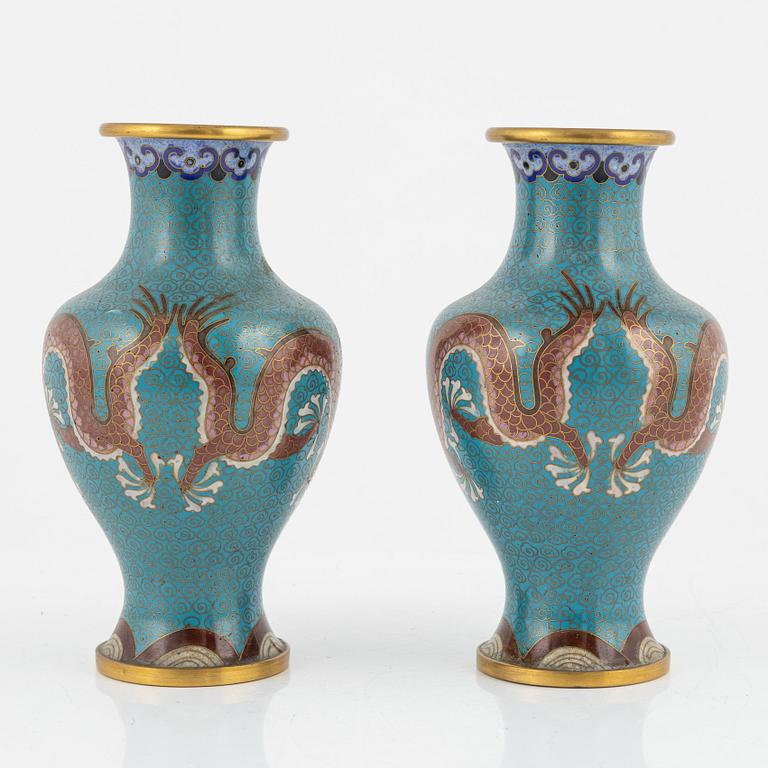 A silk clad box with two cloisonné vases, China early 20th Century.