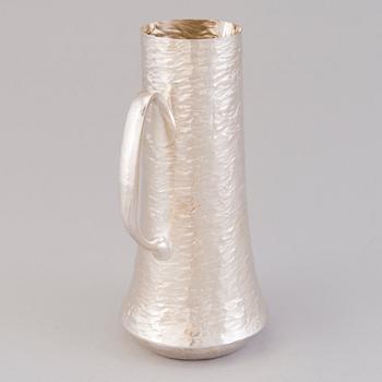 TAPIO WIRKKALA, a sterling silver pitcher and six beakers for Kultakeskus Hämeenlinna 1973.
