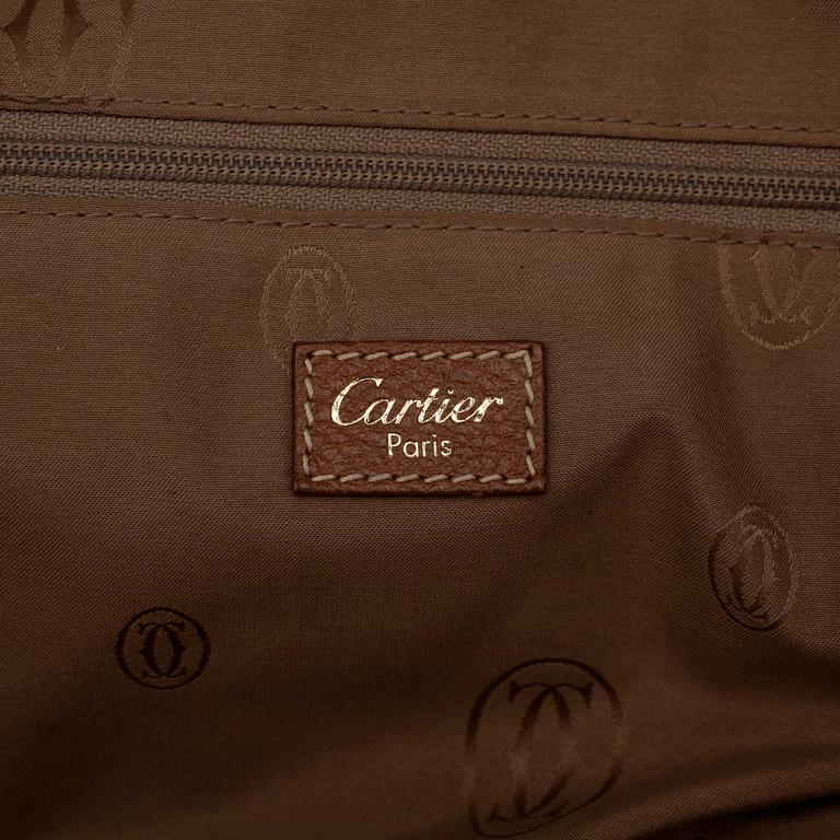 CARTIER, a brown leather bag.
