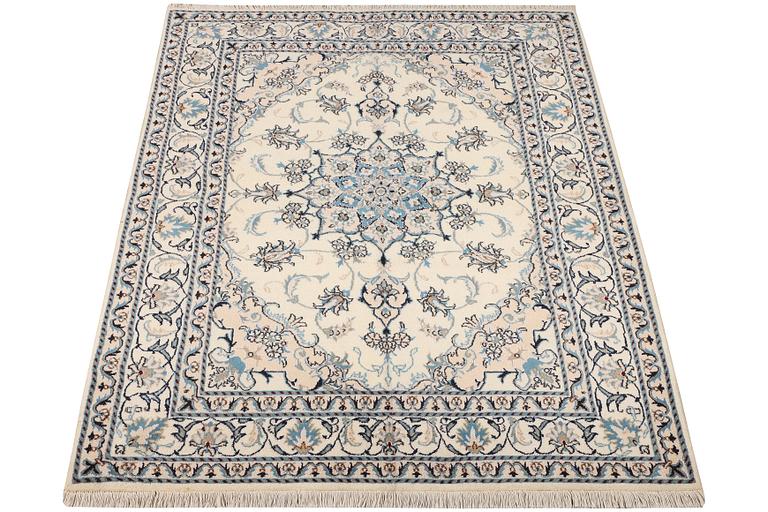 A Nain part silk rug, c. 193 x 148 cm.