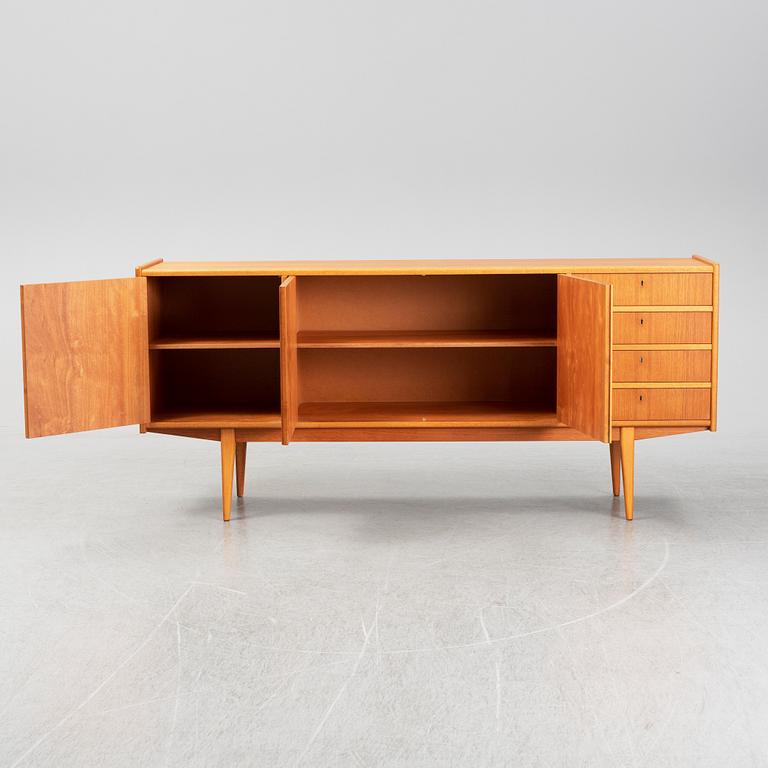 A second half of the 20th century teak veneered sideboard.
