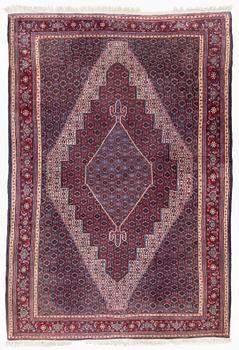 A Moud carpet of Senneh design, approx. 300 x 207 cm.