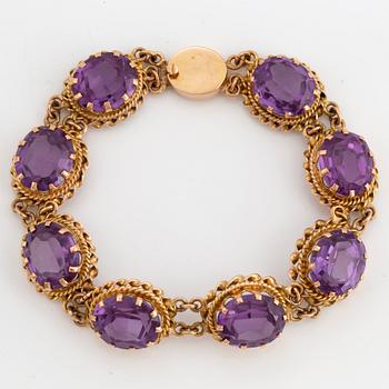 Synthetic colour change sapphire bracelet.