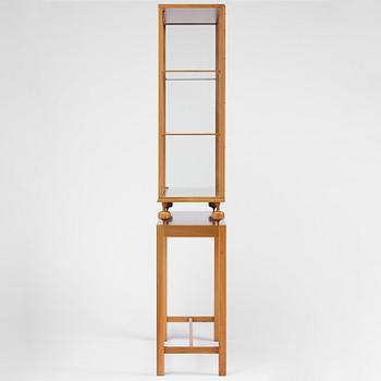 Josef Frank, a walnut showcase cabinet model "B 2077", Firma Svenskt Tenn.