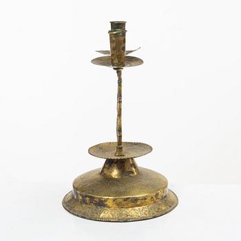 A Swedish brass two-branch candlestick, 18th/first part 19th century.