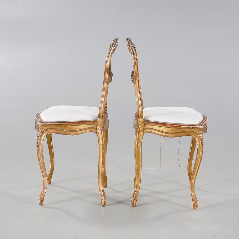 A pair of chairs from the first half of the 20th century.