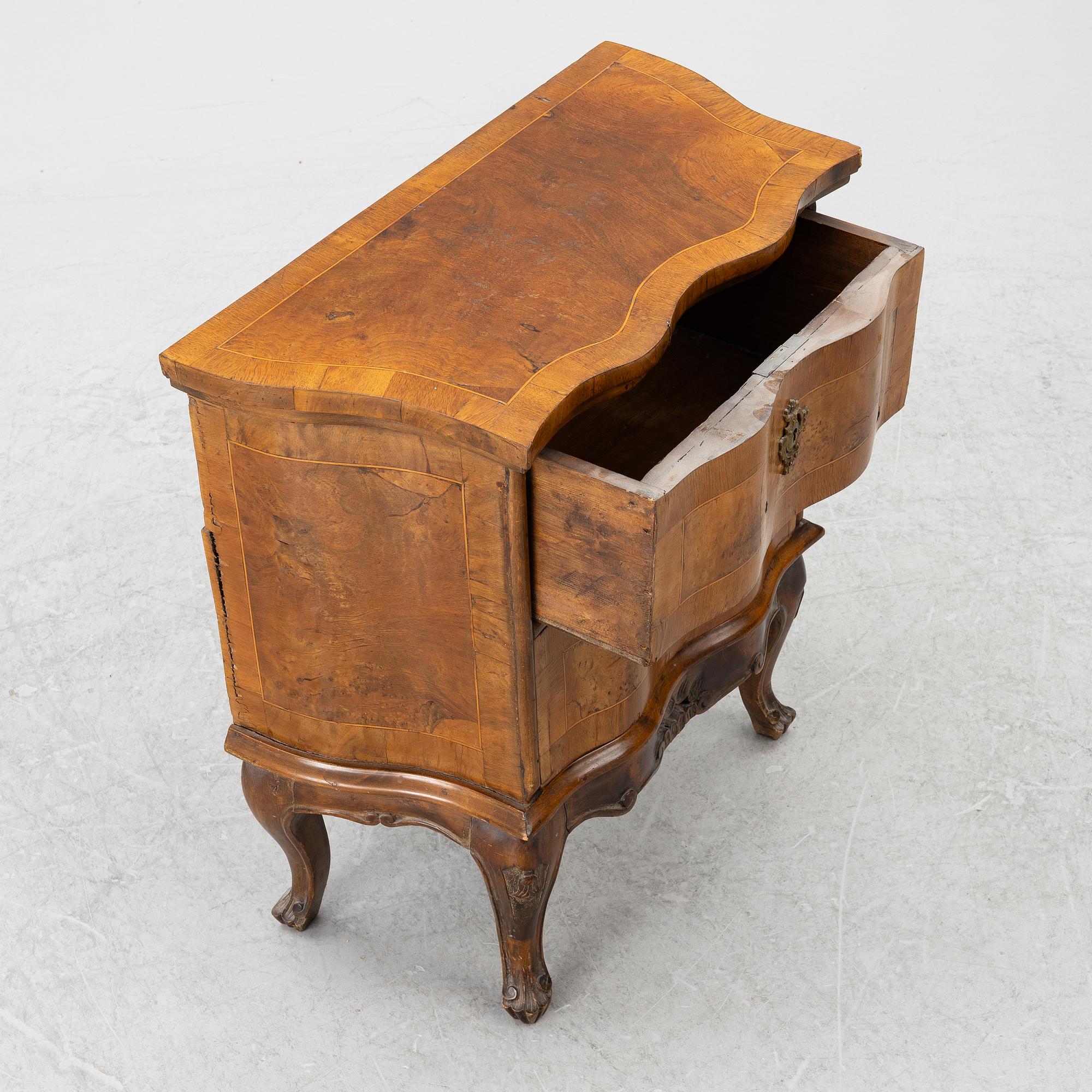A small neo-Rococo chest of drawers, 19th century.