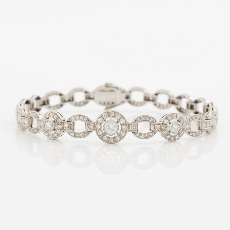 Bracelet in platinum set with round brilliant, octagonal, and rose-cut diamonds.
