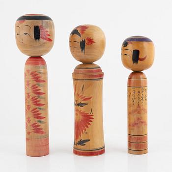 Four Japanese Kokeshi dolls, 20th Century.