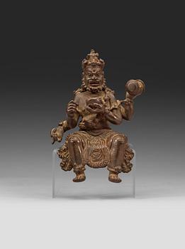 190. A seated bronze figurine. Ming dynasty.