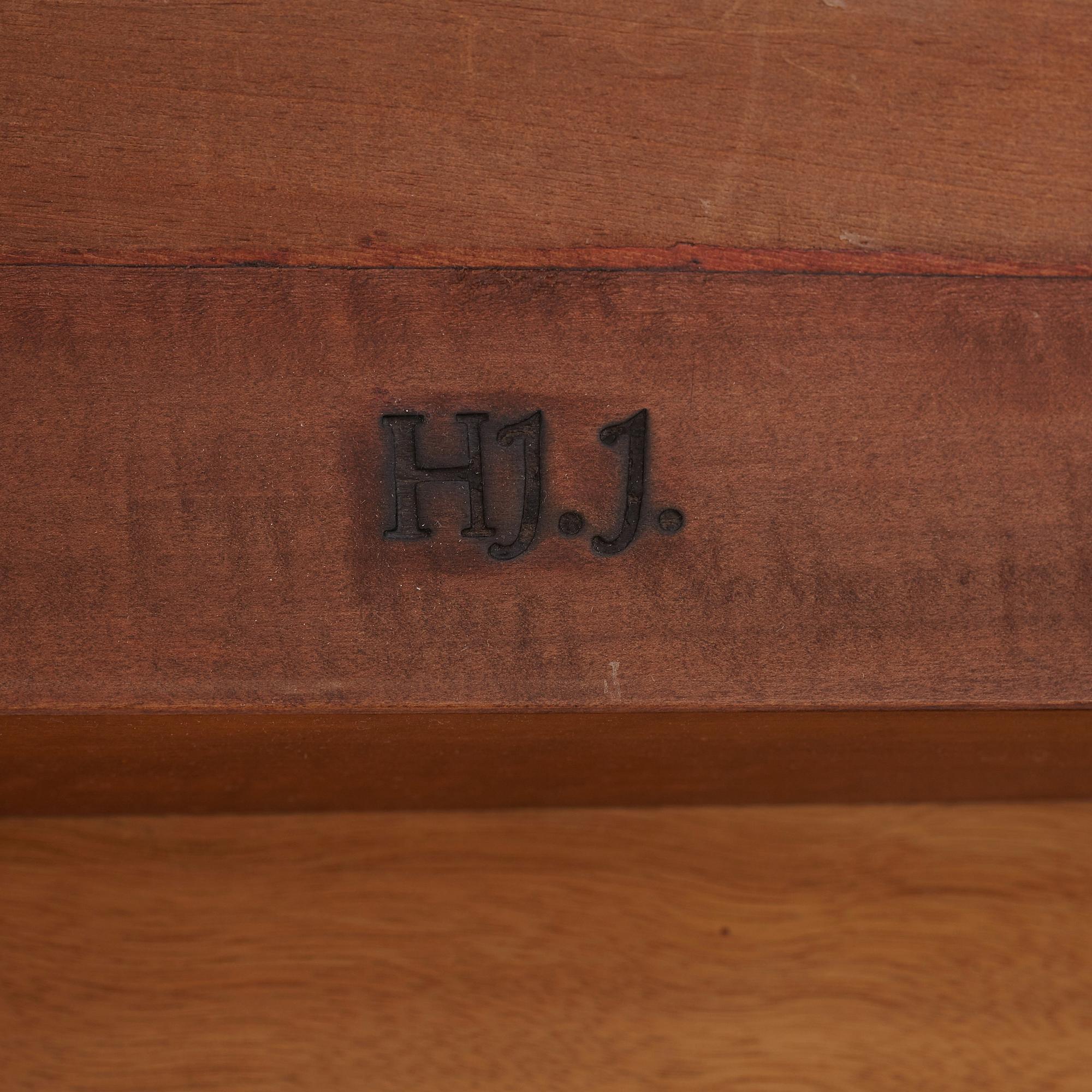 Hjalmar Jackson, A Hjalmar Jackson ebony and pearwood desk/library table, Stockholm ca 1934.