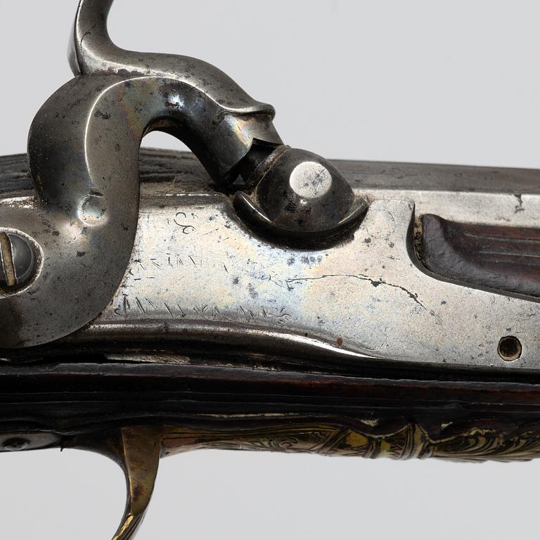 A pair of percussion pistols, converted from flintlock. 18th century.