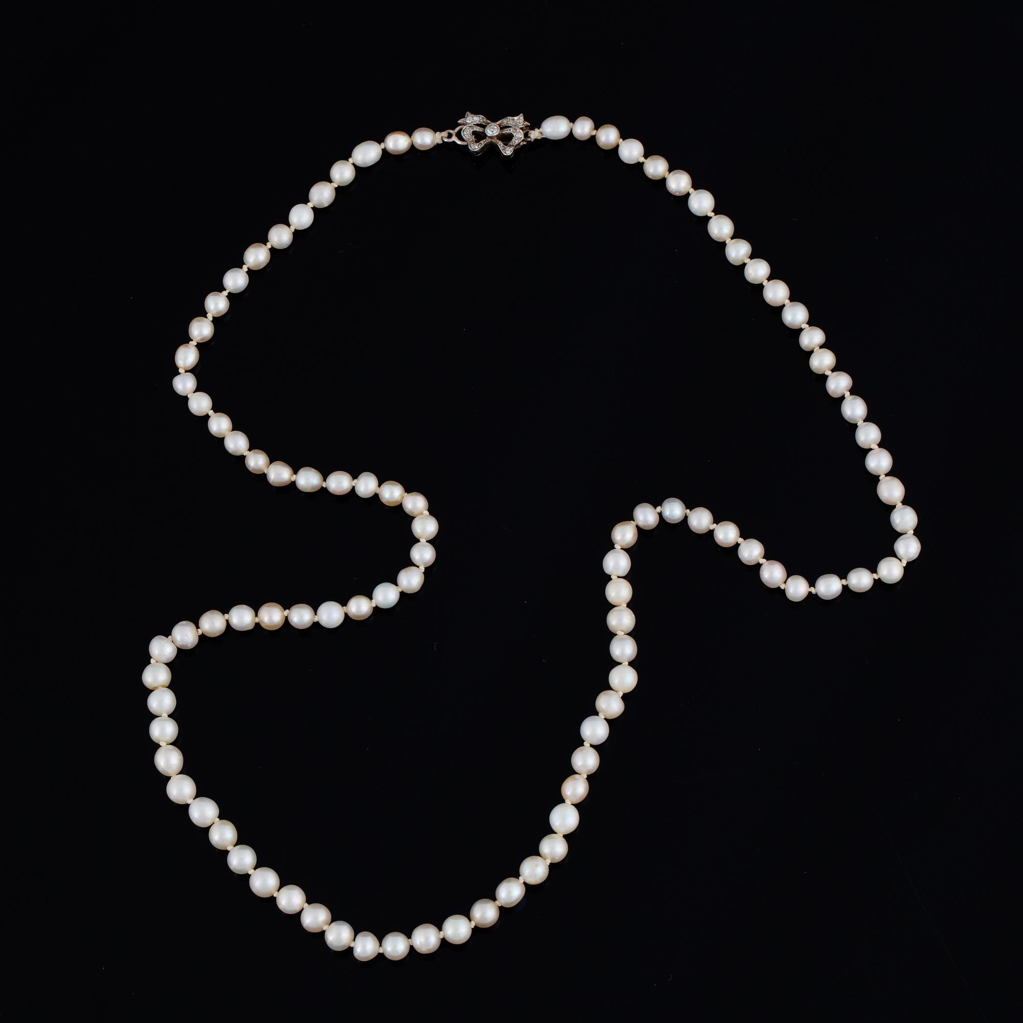 Cultured pearl necklace, clasp with old-cut diamonds.