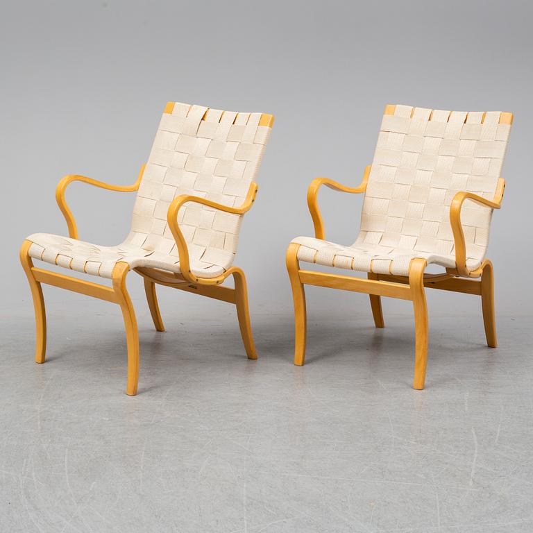 An end of the 20th Century pair of 'Mina' easy chairs  by Bruno Mathsson for Mathssson International.