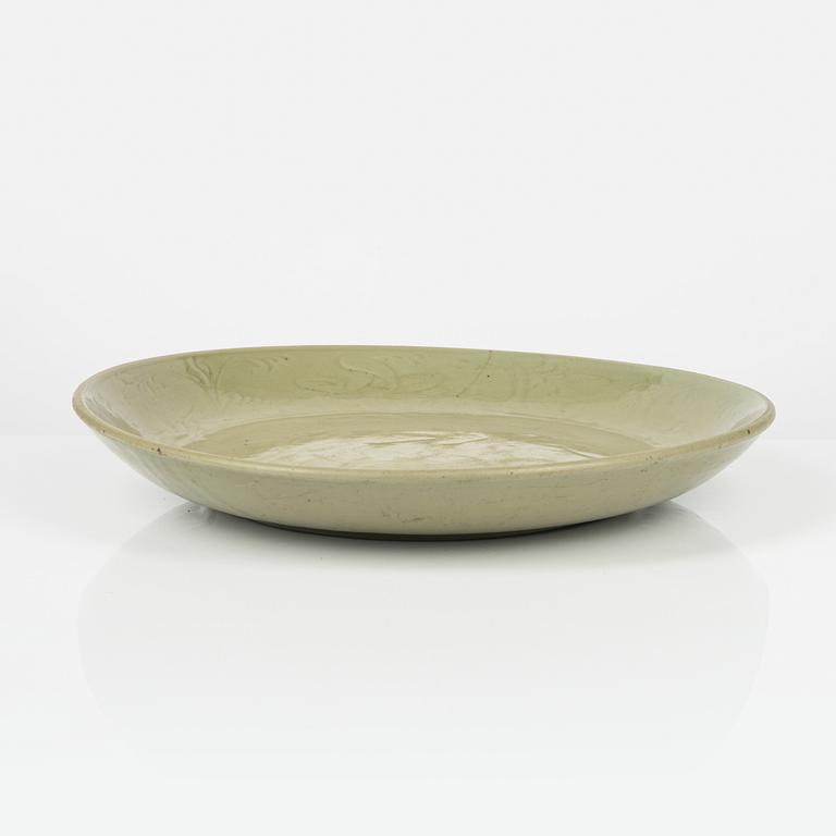 A celadon dish, Ming (1368-1644), for South East Asian market.