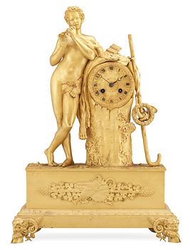 544. A French late Empire 19th Century mantel clock.