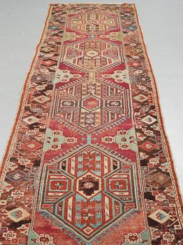MATTO, an antique Anatolian, ca 425 x 101-107 cm (as well as 2,5 cm light green flat weave at one end.
