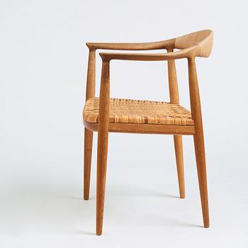 Hans J. Wegner, an oak and rattan 'The Chair', JH501, Johannes Hansen, Denmark.