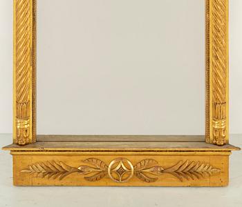 An Empire mirror from the first half of the 19th century.