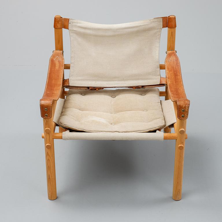 Arne Norell, a set of three "Sirocco" armchairs and two tables, Norell.